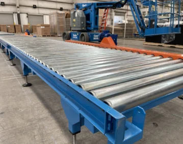 Transportador de Rodillos motorizados por cadena